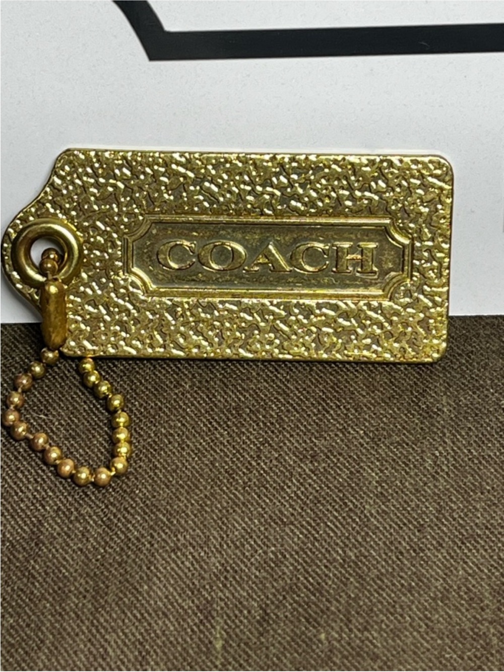 Coach Gold Textured Hang Tag